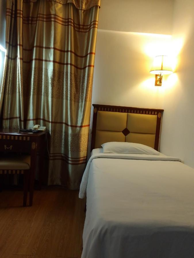 Super Oyo 90464 Borneo Suites Hotel Kota Kinabalu Exterior photo